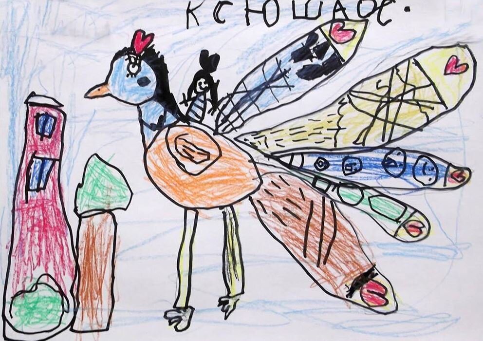 Птичка с цветными перьями