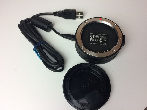 Док-станция фирмы Sigma для юстировки объективов 