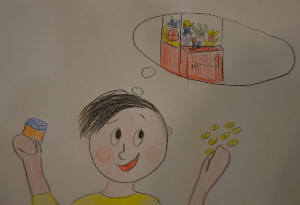 Фото автора. Даня мечтает о том, как пойдет играть в автомат с игрушками.