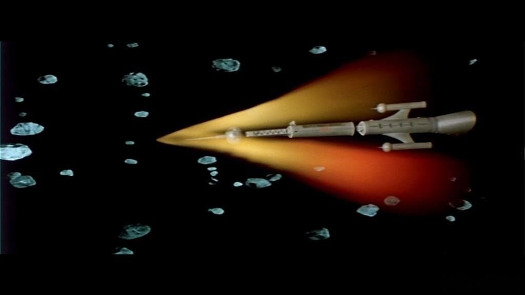 Кадр из этого фильма. Советский звездолёт бороздит просторы.