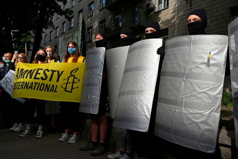 Активисты Amnesty International | Сергей Супинский / AFP через Getty Images