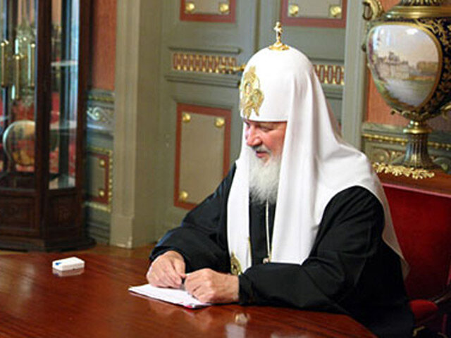 Патриарх Кирилл с часами