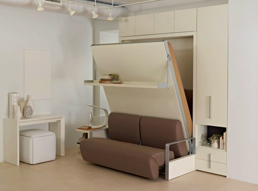 В данной галерее две картинки. Чтобы увидеть, как диван и шкаф превращаются в двуспальную кровать, наведите курсор на фото и кликните на стрелку