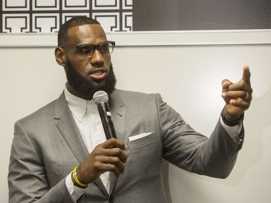 LeBron James speaks at a news conference after the opening ceremony for the I Promise School in Akron, Ohio.