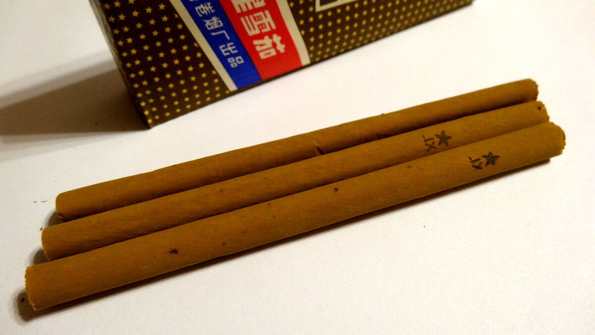 Длинные коричневые сигареты. Китайские сигареты. Китайские сигары. Китайские сигареты из 90.