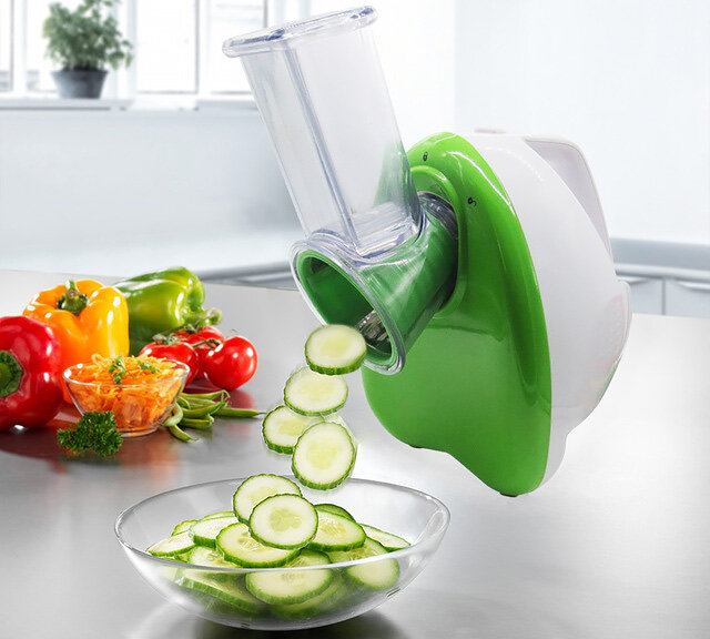 Электрический комбайн для нарезки овощей.