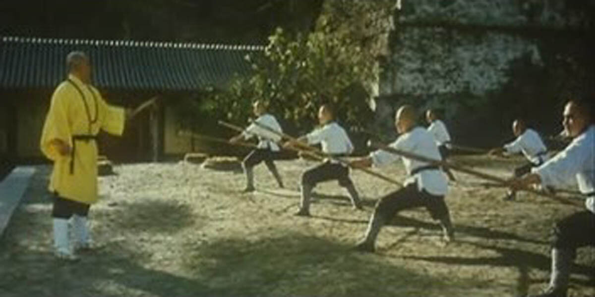 Кадр из классического фильма про боевые искусства “Храм Шао-Линя-3”
