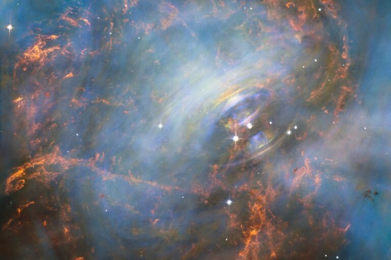    While many other images of the famous Crab Nebula nebula have focused on the filaments in the outer part of the nebula, this image shows the very heart of the Crab Nebula including the central neutron star — it is the rightmost of the two bright stars near the centre of this image. The rapid motion of the material nearest to the central star is revealed by the subtle rainbow of colours in this time-lapse image, the rainbow effect being due to the movement of material over the time between one image and another. Олег Еремеев