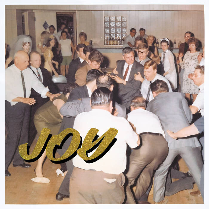 обложка IDLES – "Joy As An Act Of Resistance"