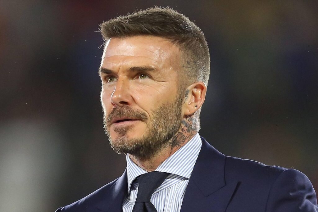 Handsome man David Beckham on a gray background Desktop wallpapers 1024x1024