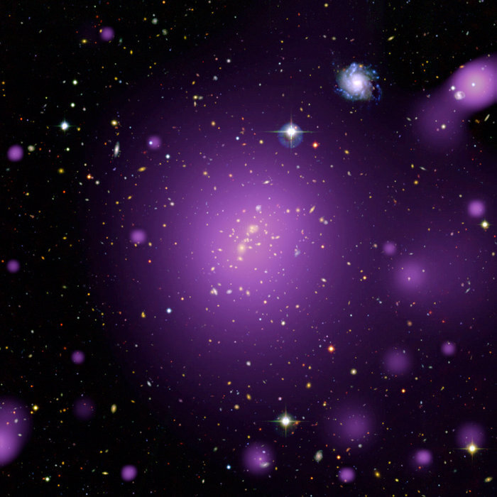 "Hot X-ray glow from massive cluster of galaxies" by ESA/XMM-Newton (X-rays); CFHT-LS (optical); XXL Survey
