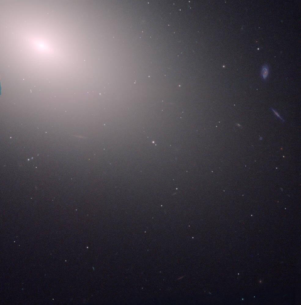   NASA, ESA, STScI, and W. Jaffe (Sterrewacht Leiden) and P. Côté (Dominion Astrophysical Observatory)