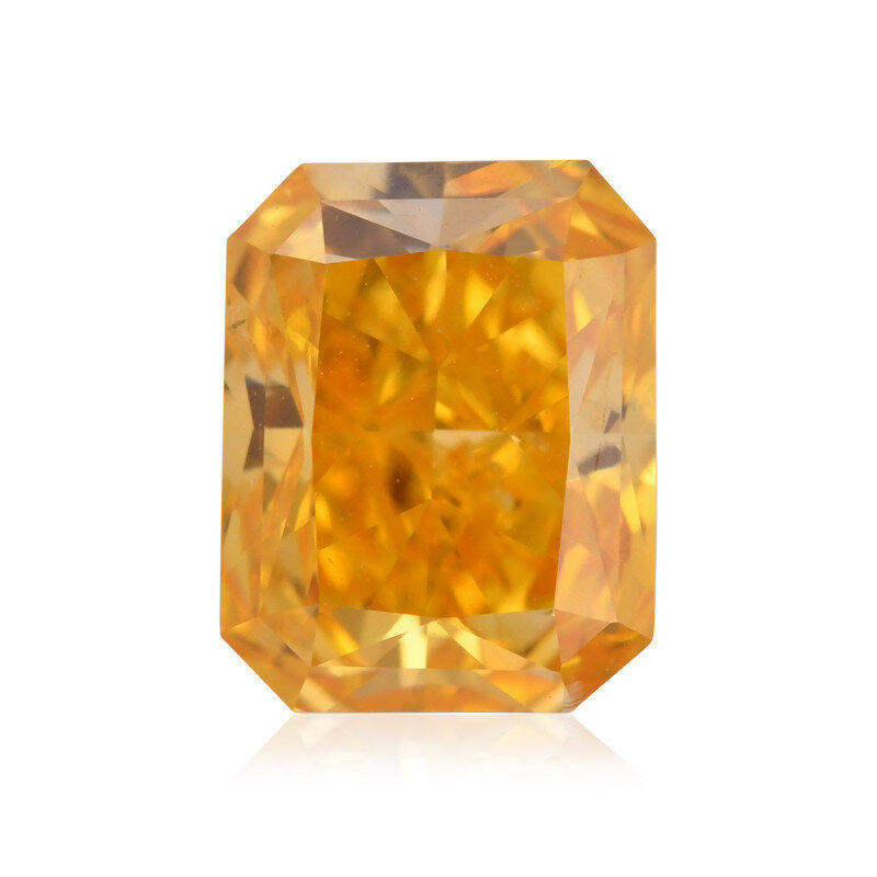 Фантазийный яркий желтовато-оранжевый бриллиант огранки Радиант с чистотой SI2 (маленькие включения заметные в лупу) и весом 0,82ct