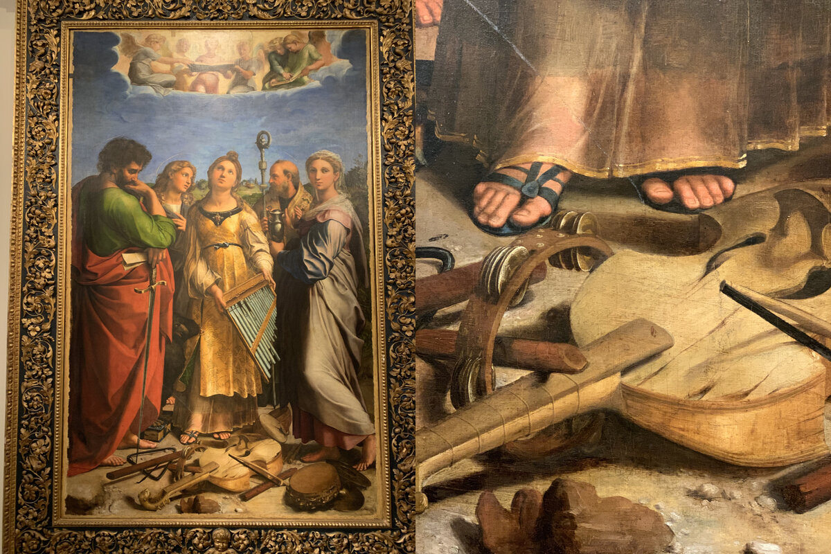 Святая Цецилия-покровительница музыкантов, у ее ног музыкальные инструменты