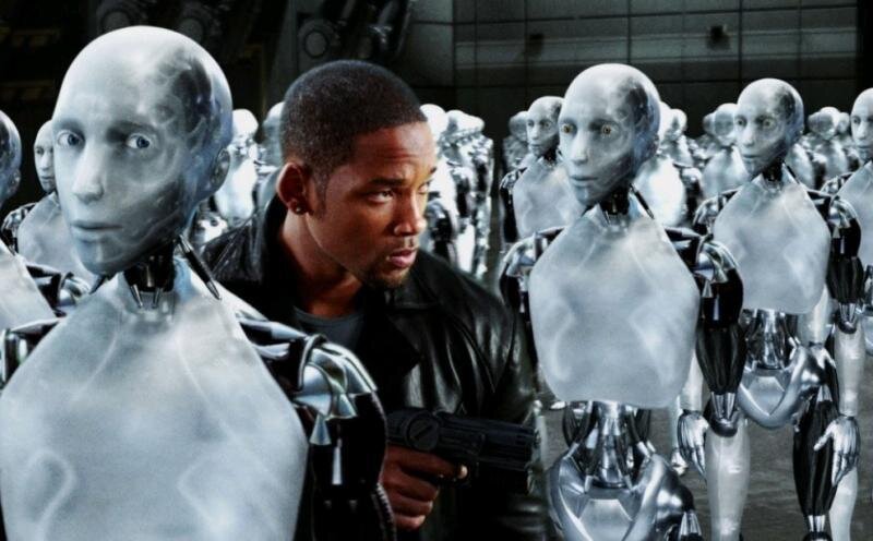 Кадр из фильма «Я, робот» (поставленный по мотивам цикла произведений фантаста Айзека Азимова) режиссера Алекса Пройаса, где герой Уилла Смита (на фото) пытается остановить захват человечества роботами