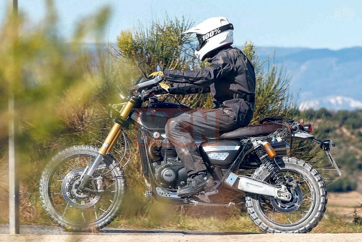 
Судя по шпионским фото, полученным весной этого года, Scrambler 1200 получит солидный внедорожный потенциал