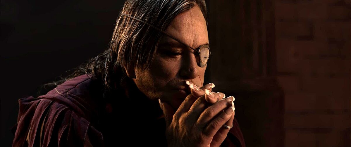 Нет повести печальнее на свете, чем Микки Рурк вот в этом, б***ь, сюжете... С повязкой на одном глазу, накладной ресницей на другом, жуткой подтяжкой морщин и маникюром истинного древнеримского полководца. 