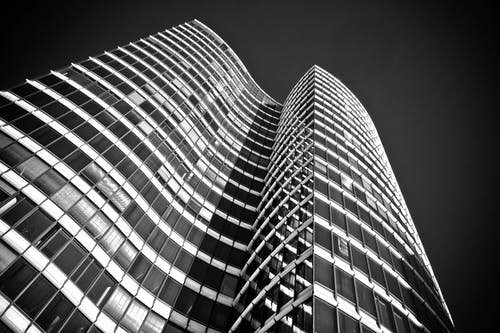 https://images.pexels.com/photos/332311/architecture-skyscraper-glass-facades-modern-332311.jpeg?auto=compress&cs=tinysrgb&dpr=1&w=500