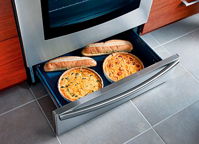 Для чего нужен нижний ящик в газовой плите: способы применения плиточного поддона