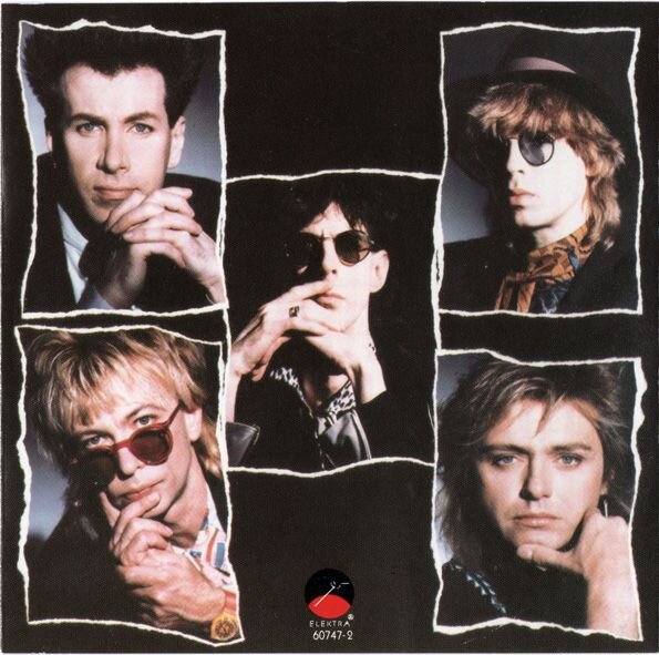 Обложка пластинки The Cars – Door To Door (1987).
