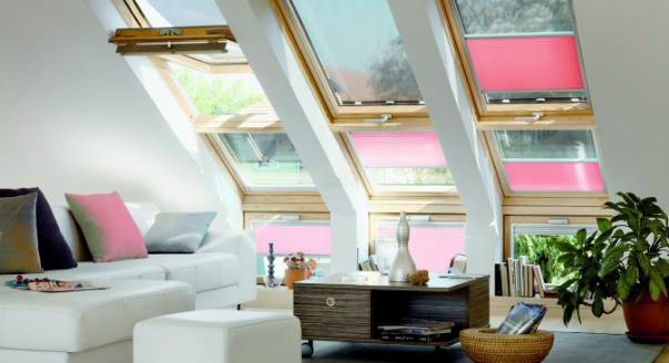 На фото: мансардные окна от компании VELUX. 