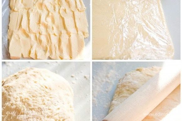 ШАГ 2

Сливочное масло	300 г Пока тесто подходит, достаньте из холодильника 300 гр сливочного масла и порежьте его. Расстелите на рабочей поверхности пленку и выкладывайте на нее пластинки масла. Долго не раздумывайте, масло должно оставаться холодным! Теперь задача такая: раскатать масло скалкой в пласт толщиной в 1 см (примерно). Как только с этим покончено - уберите масляный пласт в морозилку минут на 20 (если помните, то он завернут в пленку). Посмотрите, тесто уже подошло. Значит, скалку далеко откладывать не следует. Снова раскатывать, но теперь уже тесто. В пласт, который должен быть в два раза больше масляного.