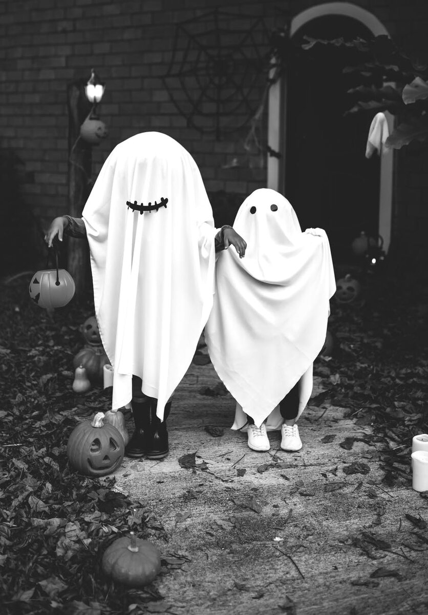 https://www.pexels.com/photo/two-people-dressed-as-ghost-149614