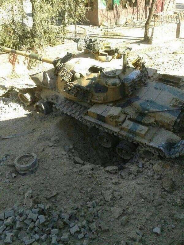 На снимке  -очередной подбитый танк взятый напрокат сирийскими повстанцами-джихадистами у Турции.  фото: картинки яндекса.