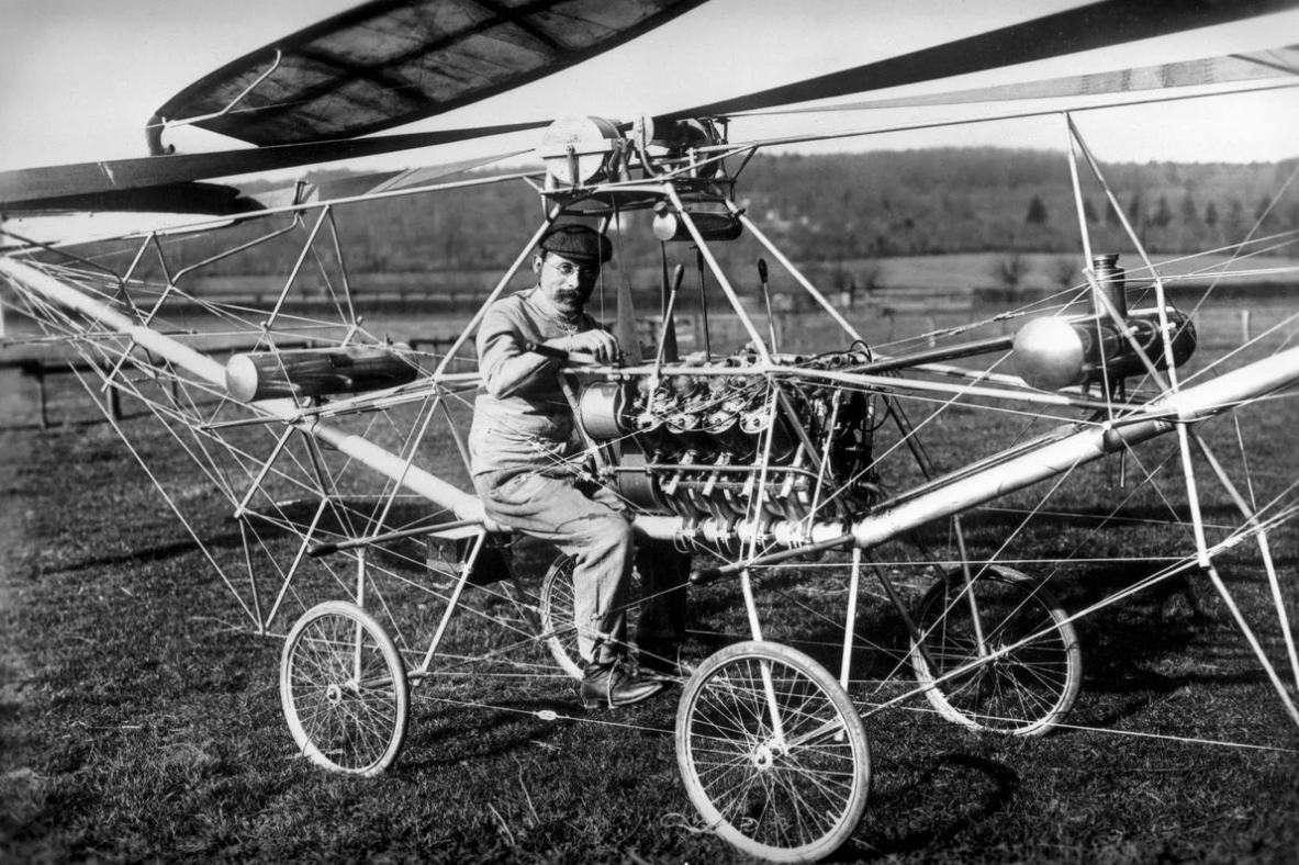 V 1 самолет. Поль корню вертолет 1907. Первый вертолет Сикорского. Геликоптер Сикорского 1910.