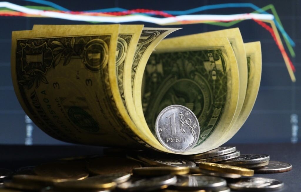 Рубль могуч..