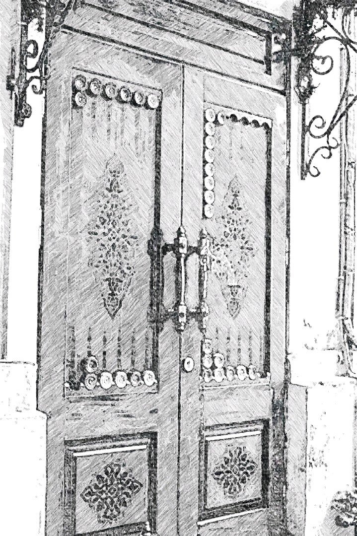 подъездная дверь одного из домов в старом городе Баку в виде доски для нард