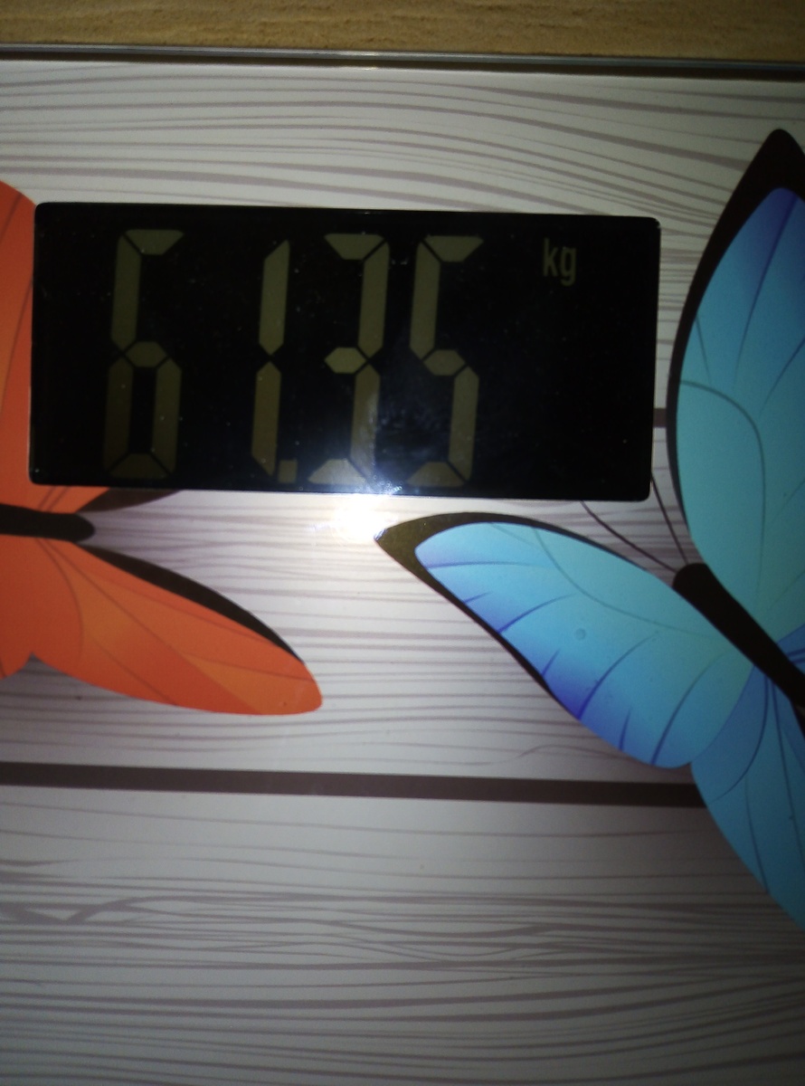 На весах 61.34 кг