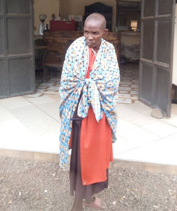 Женщина из племени масаи. Обратите внимание на ухо: обрезание - это не единственная болезненная процедура по трансформации собственного тела.