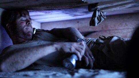 Кадр из фильма "Погребённый заживо"