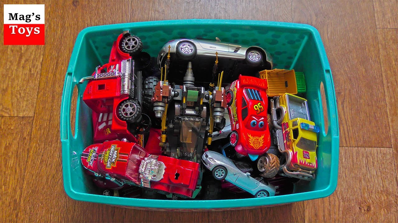 Box of cheap toy cars