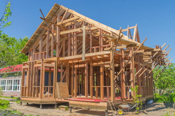 Каркасный дом на винтовых сваях