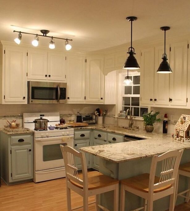 Мягкое прикосновение изумрудного цвета в изысканной кухне 