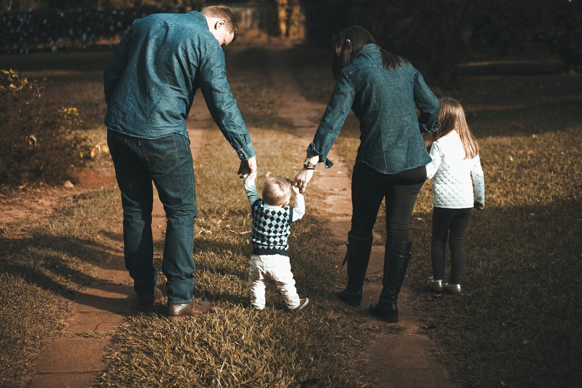 https://www.pexels.com/photo/family-walking-on-path-1682497/