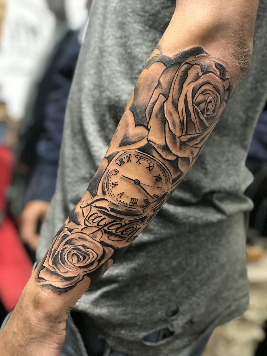 Яркие и стильные татуировки на руке для мужчин