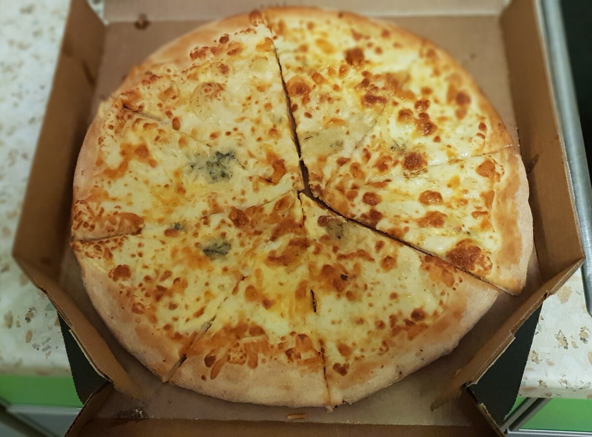 сколько калорий в куске пиццы четыре сыра фото 79