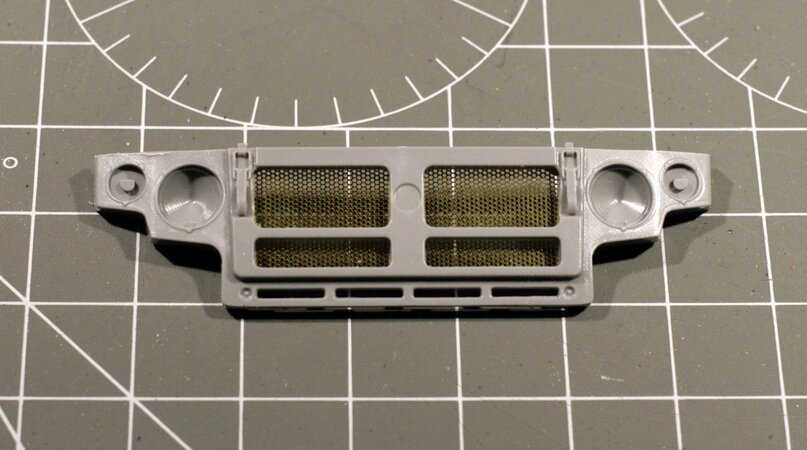 Редактировать карусель 1 из 3           Фототравленая сетка на модели Газ-Тигр. Отлить в пластике сквозную сетку не реально, а капроновая сетка смотрится хуже травленой детали.