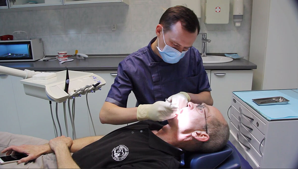 Осмотр стоматолога