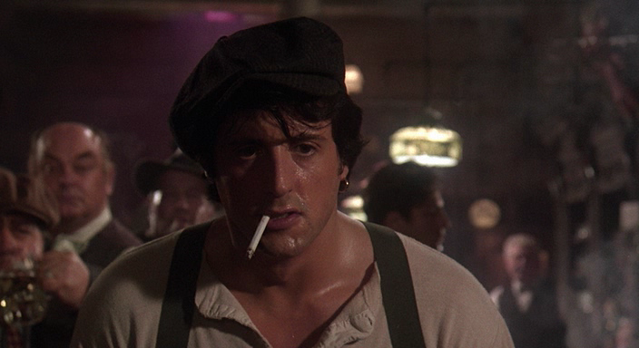 Кадр из х/ф "Райские аллеи". Сильвестр Сталлоне в роли Космо. 