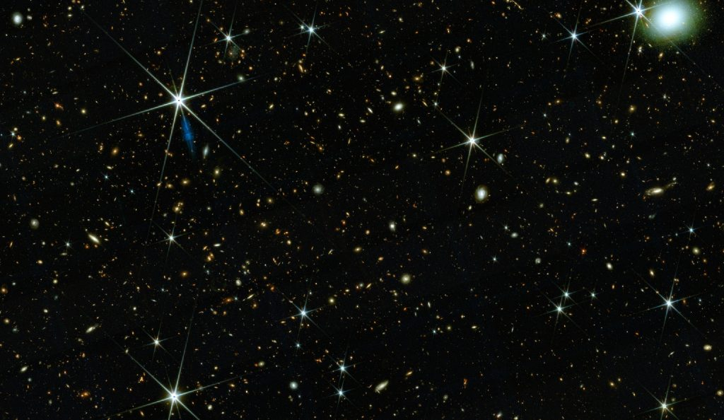 Часть огромной панорамы COSMOS-Web field, на которой видны галактики молодой Вселенной. Авторство: cosmos2025.iap.fr