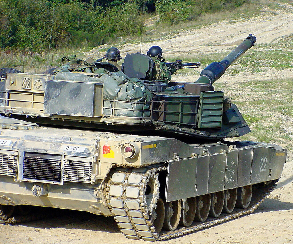   The crew of an M1A2 Abrams Main Battle Tank (MBT) prepares to engage in a force-on-force exercise. The unit, Bravo Company, 1st Battalion, 37th Armored Regiment, 1st Armored Division, is taking part in a weeklong Tank Crew Proficiency Course (TCPC) at the Friedberg Local Training Area. editor