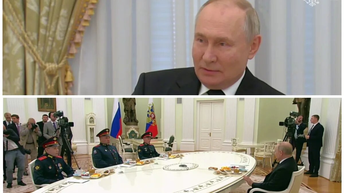 Владимир Путин и награжденные бойцы ВС РФ. Фото: кадры из видео | kremlin.ru