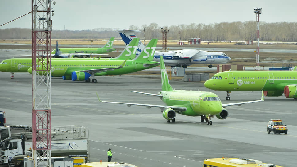 Фото: Влад Некрасов / Коммерсантъ📷Самолеты авиакомпании S7 Airlines на территории международного аэропорта Толмачево в Новосибирске