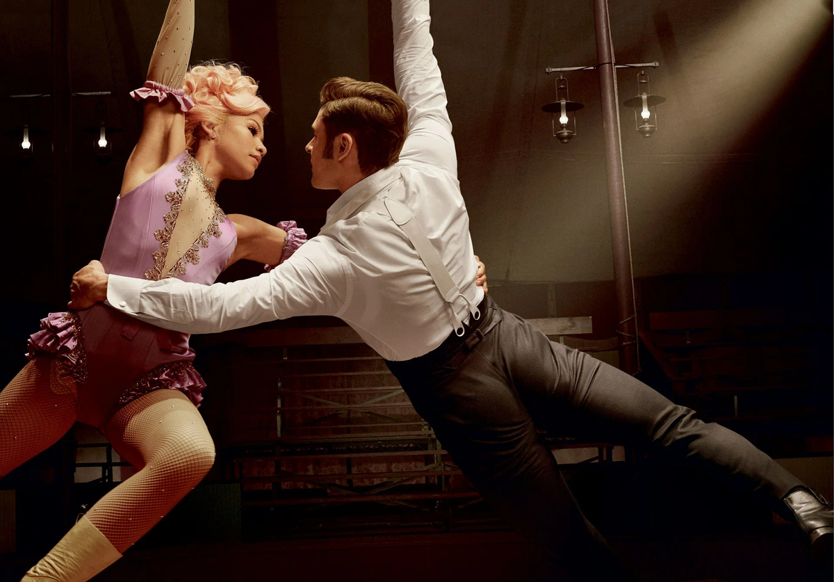 Кадр из фильма Величайший шоумен в хорошем качестве. На кадре Зендея и Зак Эфрон. Источник - https://www.kinopoisk.ru/picture/3073255/