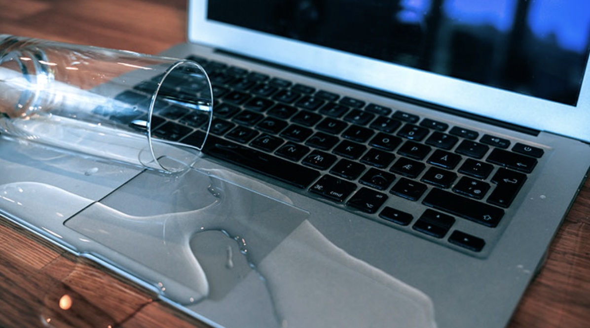 How to Fix a Water Damaged Laptop. Spilled Glass.