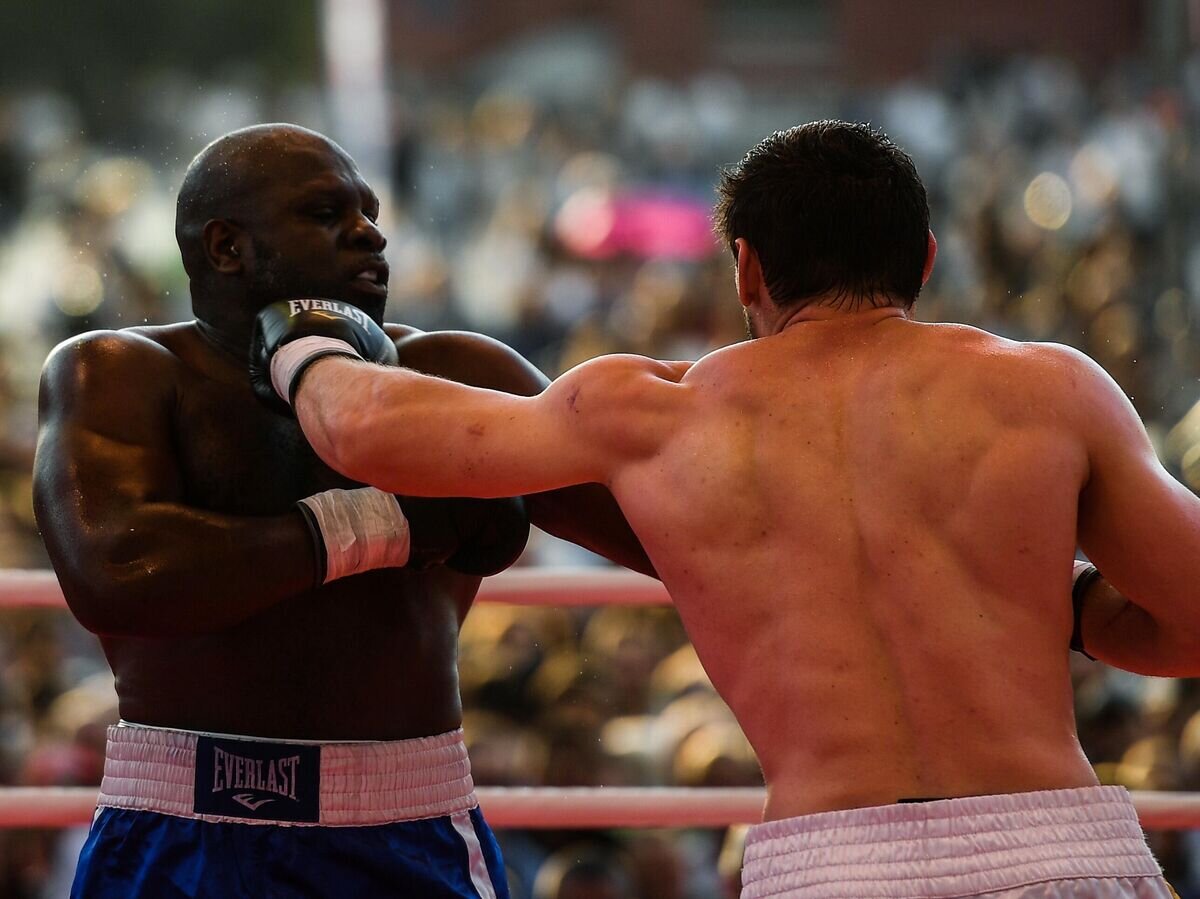    Кевин Джонсон (США) и Шигабудин Алиев (Россия)© РИА Новости / Владимир Астапкович